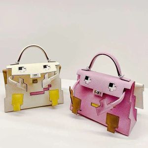 2023 neue Designer-Modetaschen, kontrastfarbene Nähte, kleine Monster-Tasche für Designer-Design-Nischen, tragbare kleine Tasche, hochwertige und exquisite Umhängetasche