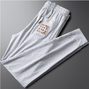 European Station Light Luxury Summer Thin Ice Silk Twill White Sports Pants Men's Loose Press Glue Bubble Letter Casual Pants