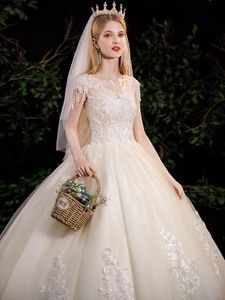 Abito da sposa lungo modesto Abiti da sposa Abiti da sposa Collo gioiello trasparente Applique in pizzo Paillettes con perline Taglie forti Robe De Mariee Abito da sposa su misura