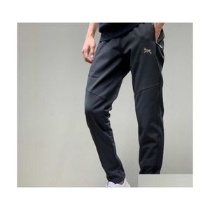 Calça masculina inverno quente masculino à prova de vento calça de algodão designer de algodão macia Mulheres ao ar livre de tamanho de sugestão entrega de gotas de entrega otatu