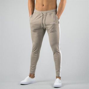 Alphalete Autumn Winter Fitness Men Gyms Pants Moda Algodão Calça Lápis Correciando Cisas de Codaneração de Alta qualidade Jogger272w