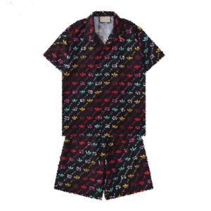 ミックススタイルの夏のデザイナートラックスーツセットメンズハワイビーチクラシックレタープリントランニングスーツTシャツ短袖TシャツTOPS TEEスポーツウェアシャツM-3XL