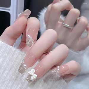 Falska naglar 24st franska pärldesign vit båge glitterpulver falsk löstagbart lim