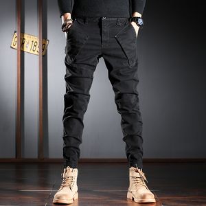 Męskie dżinsy streetwear mody mody dżinsy spodnie splicowane designerskie elastyczne szczupłe spodni ładunkowe hombre hip hop joggers men kombinezon 230516