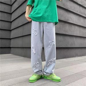 Dżinsy męskie Y2K Men Koreańska moda streetwear Hip Hop Low Rise Worbgy Spoders Cross Mens Denim Pants Women Overized Boyfriend Ubrania