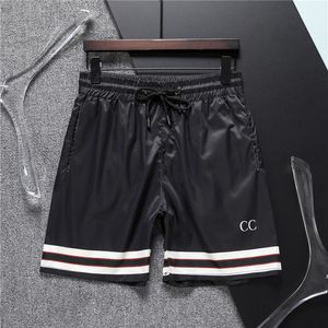 shorts masculinos verão novo shorts esportivos de tendência casual calça de praia masculina correndo esportes de fio de shorts soltos shorts m-3xl g01