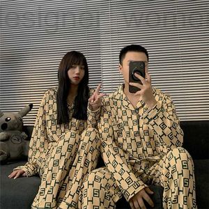 Pontas de duas peças femininas Designer outono de inverno algodão correspondente de casal de pijama de pijama de roupas de dormir para mulheres casas de casas de casas de casa branca letra de pijama homme conjunto Levz Juuz