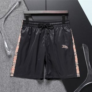 Shorts masculinos Summer New Knight Logo Lattice shorts Casual Trendência Casual Pants de praia Running Sports Interior Camada de shorts soltos Tamanho M-3xl B1