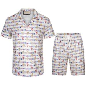 YY2023夏のファッションメンズトラックスーツハワイビーチパンツセットデザイナーシャツ印刷レジャーシャツ男