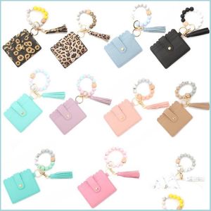 Party Favor Sile Bead Armband Leopard Card Bag Wood Beaded Pu Leather Tassel Keychain Portable Ladies Plånbok med Snap Drop Deliver Dhzat