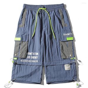 Calças masculinas 2023 verão cargo shorts masculino solto de náilon casual ao ar livre praia design original com vários bolsos comprimento da panturrilha curto