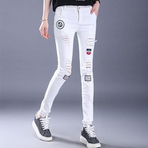 Джинсы Spring Women White Denim Jeans Korean Fashion Slim Cartoon Graffiti Prant Hole Джинсы брюки Capris ковбойские брюки лето Lu1876