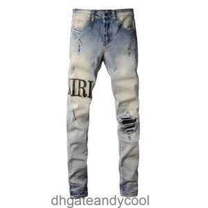 Calças de brim altas calças de designer homem denim rua marca de moda lavada amirres velho buraco jeans camuflagem de couro elástico magro ajuste calças x6ez