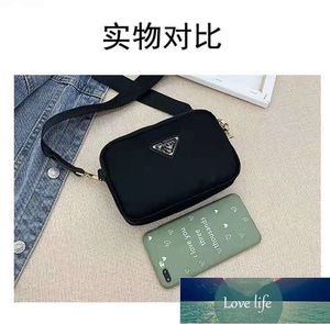 Novo ombro único crossbody coreano Fashion Triple Zipper Oxford Cloth Street Trendy Crossbody Bags Top Quality