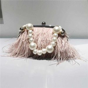 Bolsas de ombro, marca de luxo, alça 2023 Moda Feminina Carteira Retro Lux Novo Temperamento Feathers Pérola Chain Crossbody Clutch 230426