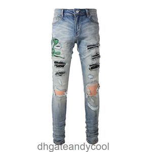 Azul homem denim lavagem amirres mx1 jeans cobra bordado designer calças água velho joelho buraco magro jeans masculino high street iwos