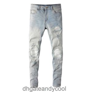 Amirres Jeans Designer Pants Man High Street Fashion Brand Light Denim Color Wash Water do Old Holes White Patch Fit Castiral Jeans with Small Feet Men ZFP4
