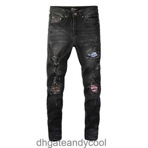 Svart denim mode amirres tvättade jeans märkesdesigner ko byxor man vatten trasigt hål gammal cashew blomma kontrast färg smal fit elastiska fötter denim pan 9o70