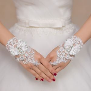 ST-0029-A etykieta rękawiczek ślubnych biała krótka rękawiczka kokardka z diamentową koronką otwarty palec bez palców piękna suknia ślubna akcesoria