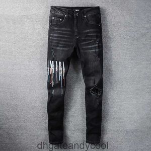 Loch Denim alte Amirres Jeans bestickt Designer gemacht Hosen Mann schwarz Buchstaben Spritzer Tinte elastische Slim Jeans Herren High Street Fashion Marke MX2 44F1