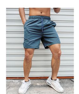 Pantaloncini da corsa 2023 Estate Uomo Allenamento Sport Asciugatura rapida Bodybuilding da uomo Walking Jogging Trainning Pantaloni da tuta all'aperto