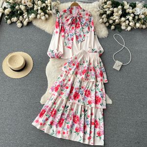 Tvådelad klänning Spring Runway Vacation Suit Women Bow Neck Flower Print Långärmor Blusar + Högt midjeskikt Cascading Maxi Kjol 2 Pieces Set 2023