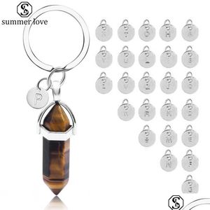 Nyckelringar Ankomst Nature Crystal 26 Inledande brevkedjeläkare för kvinnor män mode smycken gåva släpp leverans dhgxz