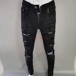 Roupas de grife Amires Jeans Calças jeans perfuradas para homens Amies Preto Slim Fit Remendo de sucata elástico Rua principal Moda jovem Versátil Amr Distressed Ripp