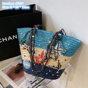 Factory wholesale ladies shoulder bags 3 colors niche design woven straw handbags sweet flowers embroidered handbag summer romantic holiday beach bag 4735#