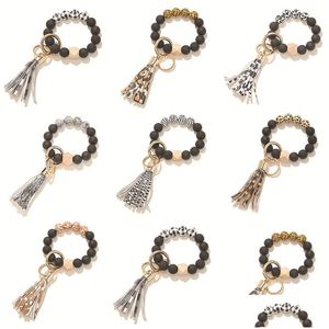 Keychains Lanyards Frosted Wood Pärled Keychain Leopard Tassel Pendant Ladies Wrist Armband Key Chain Fashion Jewelry Keyring D Dhope