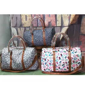 Borse da viaggio europee e americane Borsa da viaggio colorata con stampa leopardata Moda Borse da passeggino da donna Breve viaggio all'ingrosso portatile