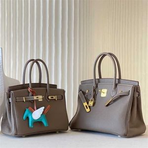 Platinum 2024 Hög Tote Bag Quality Leather Kvinnors uppgraderade elefantgrå huvudko läder stor kapacitet Kvinnor handväska