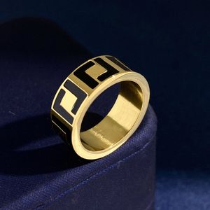 Tillverkad i Italien designer f ring extravagant emalj ihålig guld silver rose rostfritt stål brev ringer svarta vita kvinnor män bröllop smycken 670i#