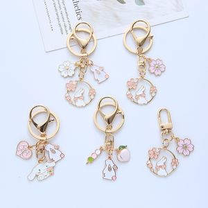 ins Japanese cute girl cherry blossom rabbit keychain cat pendant creative couple jewelry lanyard earphone pendant