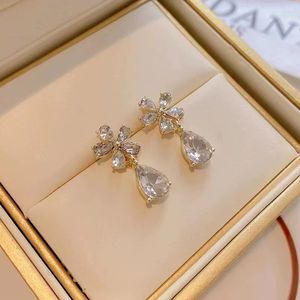 Nya eleganta Zircon Pearl Flower Stud örhängen för kvinnor Korean Bowknot Heart Shape Flower Earring Girl's Party Luxury Jewelry