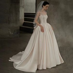 Brautkleider aus Satin in A-Linie, mit Perlen verziert, Hofschleppe, rückenfrei, Gartenhochzeit, Brautkleider, Schleife, Elfenbein, Tüll, Plus-Size-Brautkleid, Vestido de Novia, Saudi-Arabien