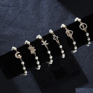 Pulseira de pérolas simatadas com miçangas para mulheres moda shinestone cruzamento redonda estrela -texuja charme de ouro jóias de jóias de jóias Drop de dhdvj