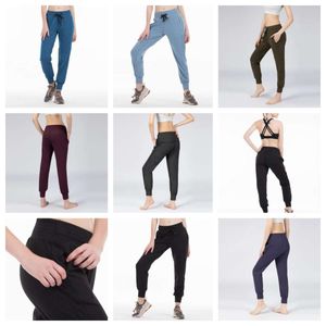 Naked Feel Fabric Yoga Workout Sport Training Joggers Pants Women Leisure Outdoor Gym Midja i midjan Drawstring Fiess Running Sweat Byxor med två sidor Pocket Style