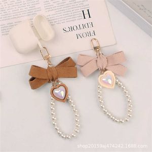 Keychains Fashionable fabric bow keychain pearl resin heart-shaped keyring charm suitable for women's packaging car keyholder accessories gifts G230526