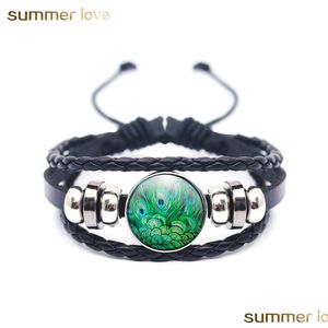 Andere Armbänder Design Pfauenfeder Om Yoga Chakra Anhänger Mode Glaskuppel Heilige Geometrie Armband für Frauen Mädchen Schmuck Dr Dh7LD