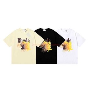 Designer Moda Roupas Camisetas Rhude Summer Novo Gradiente Cor Padrão Impressão Solto Casual Homens Mulheres Manga Curta Rua Principal Casal Camiseta Decote Redondo Tren