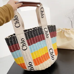 2023 Ny designer Tote Bag Fashion Stripe Contrast Grass Woven Bag Stor vävd handhållen shoppingväska strandpåse