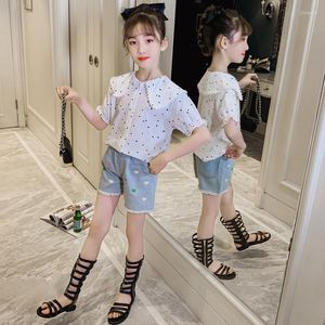 Completi di abbigliamento 2023 Estate Bambini Vestiti per ragazze Manica corta Cuore bianco Camicia a pois Camicetta Pizzo Jeans Pantaloni Bambino 4 6 8 10 11 12 anni Adolescenti