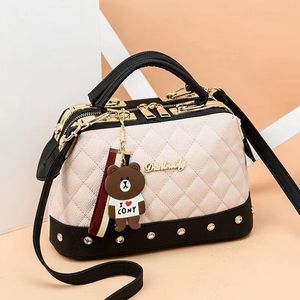 2023 new Korean version of bear hanging ornaments women's bag fashion matching Ling lattice single shoulder cross-body handbag exquisite design fine workmanship