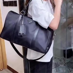 Designer Duffel Bags Luxury Mens Bagage Womens Commerce Travel Bag Nylon Handväskor Stora kapacitet Vattentät Holdall Carry On 2305264BF