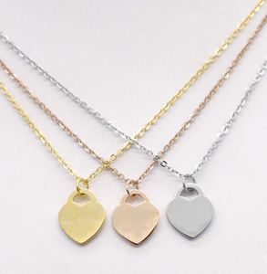 Rostfritt stål mode hjärtformat t halsband korta kvinnliga smycken 18k guld titan persika hjärthänge för kvinnlig tidvattenström
