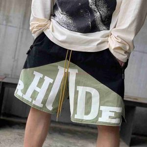 Erkek Şort Tasarımcısı Kısa Moda Giyim Plaj Şortları Yüksek Sokak Rhude Mektubu Çift Renk Panel Drawstring Trend American Joggers Sports Giyim Açık