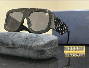Designer solglasögon kvinnor modemodell special uv 400 skyddsbrev stor ben dubbel strålram utomhus varumärken design legering diamantglasögon 6009