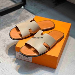 Men Slippers Flats Designer Sandálias de couro genuíno verão Izmir Flip Flop Oran Heritage Calfskin Sandal for Man Woman Lazy Grande praia