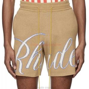 Designer Short Fashion Casual Clothing Shorts de praia K590 Rhude Letter Jacquard Cordão Malha Lã Moda Rua Principal Masculino Feminino Esporte Solto Amarelo Azul Sho